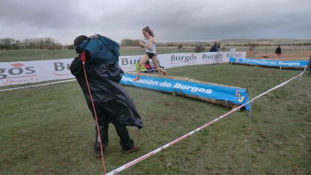 Lydia Turner tackles the log with TV covering it
